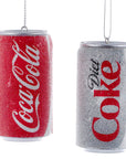 Decorative Christmas ornaments shaped like Coca-Cola and Diet Coke cans on a white background