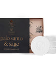 black shower steamer box with 4 shower steamers inside. "palo santo & sage" is written in gold on the box