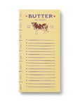 Notepad with a cow illustration and 'Butter' text on a white background