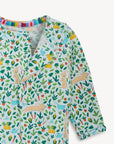 Children's long-sleeve shirt with a colorful animal pattern on a white background