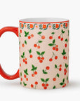 cherry porcelain mug on a white background