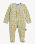 Green checkered baby onesie with orange patterns on a white background