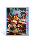 Jigsaw puzzle box with a scenic outdoor breakfast setup and 'Piecedwork Puzzles' branding.