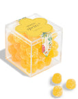 Clear cube container with yellow gummy bears labeled 'Lemon Spritz' on a white background