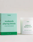 weekends playing tennis candle on a white bacgkround