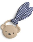 Bear-shaped teether with a blue checkered cover on a white background