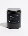 A black glass jar candle with a black lid and a black label featuring white text and star illustrations. The label reads 'COPAL POURED IN CALIFORNIA WITH 100% SOY WAX' and 'P.