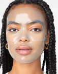 girl wearing translucent blue sheet mask