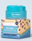bright blue body scrub on top of amalfi coast packaging