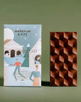 Chocolate bar with geometric pattern and packaging featuring 'Markham & Fitz' on a green background