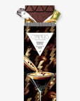 Dark chocolate bar with a martini illustration and 'Compartes' branding on a white background
