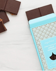 dark chocolate bar filled with caramel in tiffany blue packaging