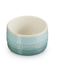 Candle with a minimalist design on a light gray background