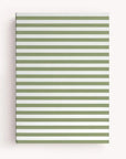 green striped notebook on a white background