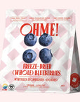 freeze dried blueberries on a pink background
