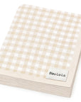 Beige and white checkered blanket with 'Bleu-La-La' label on a white background