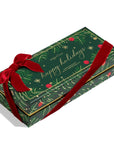 A rectangular gift box wrapped in a red ribbon, featuring a dark green holiday design with gold text reading 'happy holidays' and gold botanical line art. The box is photographed on a clean white background with a soft shadow.