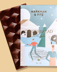 Gingerbread Jingle chocolate bar with Markham & Fitz packaging on a beige background