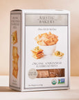 Box of Rustic Bakery Organic Sour Dough Flatbread Bites on a beige background