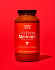 Sauz Hot Honey Marinara sauce bottle on a red background