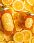 lemon marmalade jars on top of lemon slices