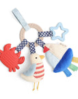 Colorful baby toy with a bird, crab, and star on a white background