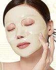 Woman wearing a face mask with a blurred background