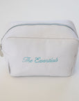 white embroiderred makeup bag on a white background