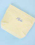Yellow striped underwear with 'Flyte' branding on a light blue background