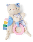 Cat-shaped plush toy with colorful elements on a white background