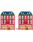 Two identical red holiday house-shaped advent calendars with Christmas decorations, windows, snow, and the number 24, shown on a white background.
