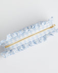 Blue Gingham Ruffle Pouch with gold zipper, on white background