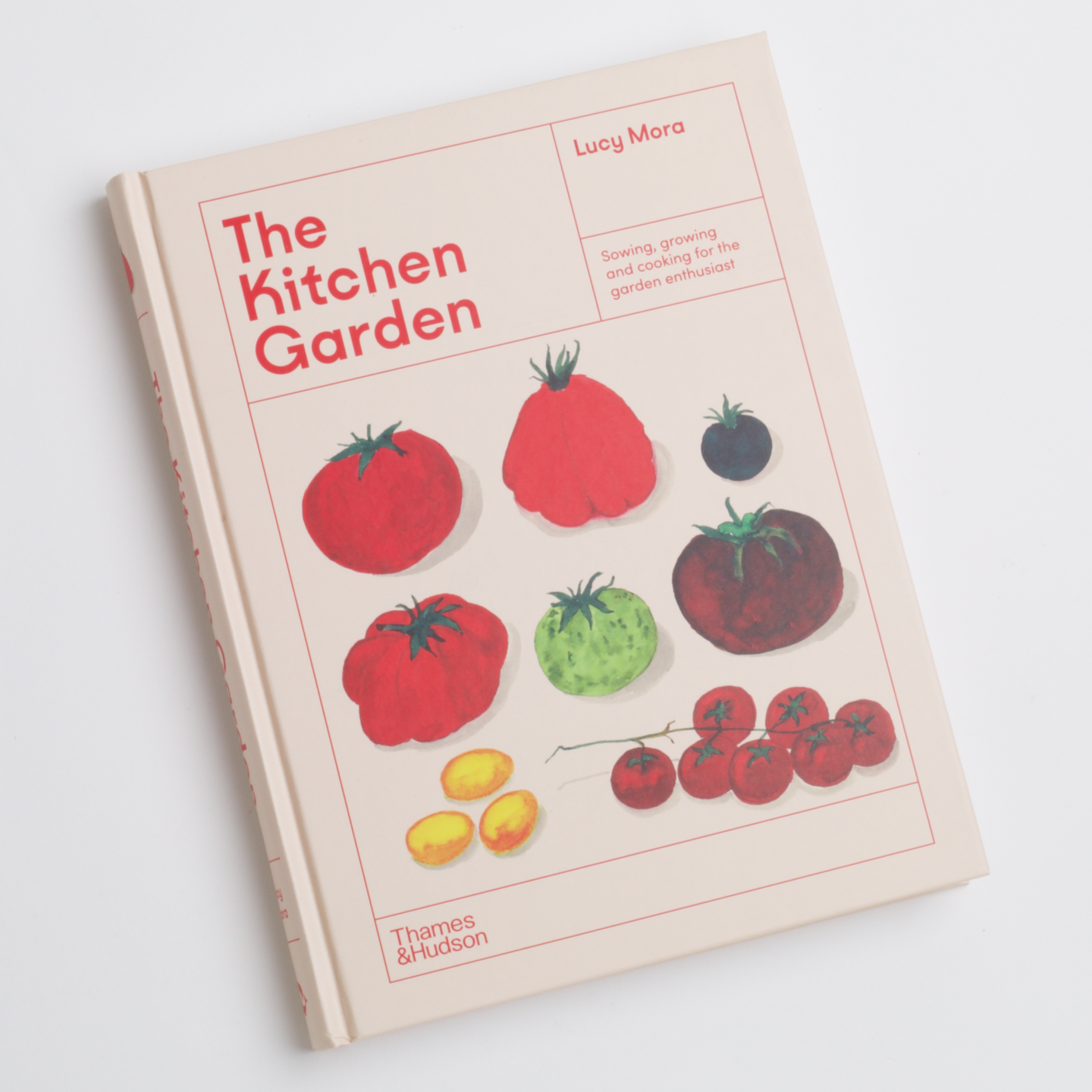 Cover of The Kitchen Garden cookbook with vegetables on it