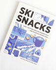 Book titled 'Ski Snacks' with blue illustrations on a white background