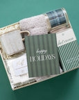 Gift set with bath products on a green background