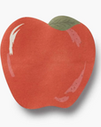 Red apple-shaped object with a green leaf on a white background
