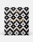 Pack of chocolate with black and white pattern on a white background
