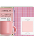 Pink mug and stationery set with 'Tea with Tae' branding on a white background