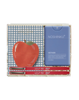 Noshinku Vetiver hand sandalwood essential oil kit in a gift box, featuring a blue plastic bottle, three red pencils, and a red apple illustration on a blue-and-white checkered background.