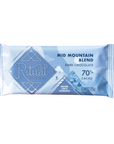 A single wrapped chocolate bar from Ritual Candles, labeled 'Mid Mountain Blend Dark Chocolate 70% Cacao', in a light blue and white foil wrapper against a plain white background.