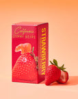 Box of California Gummy Bears Strawberry Sensation with strawberries on a peach background