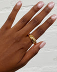 Girl wearing gold ring