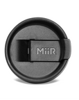 Black MiiR coffee cup lid on a white background
