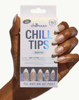 Chillhouse Chill Tips packaging held by a hand with polka dot nail designs.