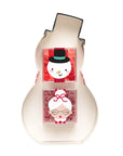 A snowman-shaped container or box with two clear front windows showing red candies inside, decorated with cartoon snowman and snow woman faces, on a plain white background.