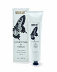 Shea butter hand and body crème with packaging featuring a butterfly design on a white background