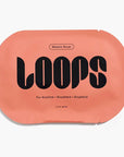 light red sheet mask that says 'LOOPS' on it