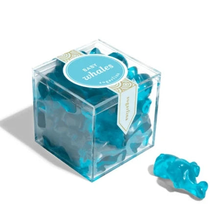 Clear plastic cube with blue whale gummies inside