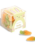clear candy cube filled with carrot shaped gummies