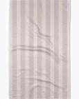 Striped fabric with pink and white pattern on a white background
